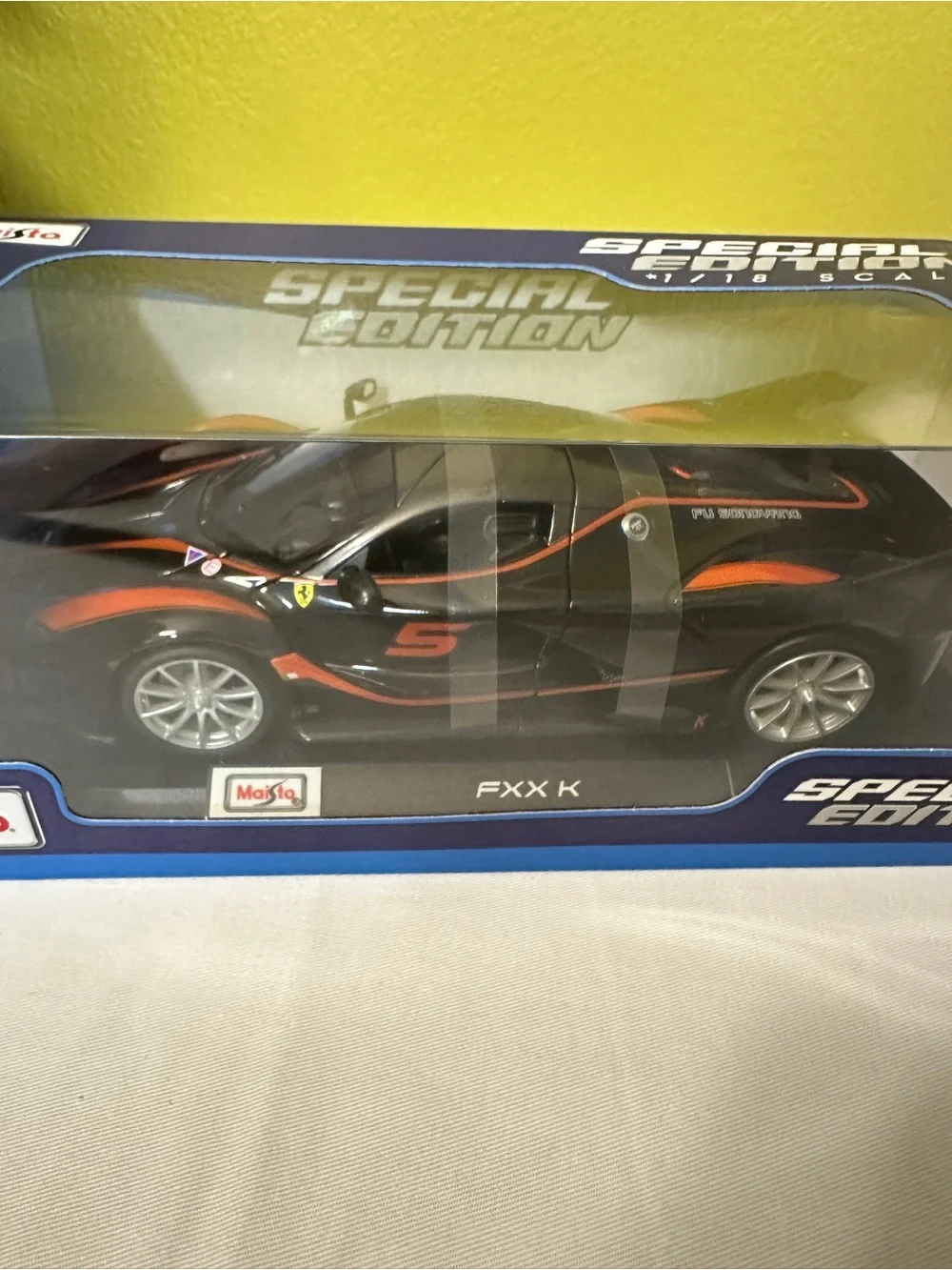 🚗FXX K Black & Orange Diecast Car